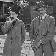 Screenshot of Charlie Chaplin in Making a Living
